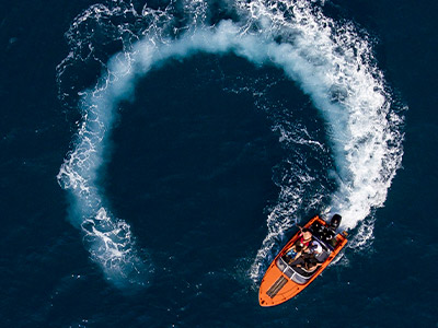 boat driving in a circle on the water