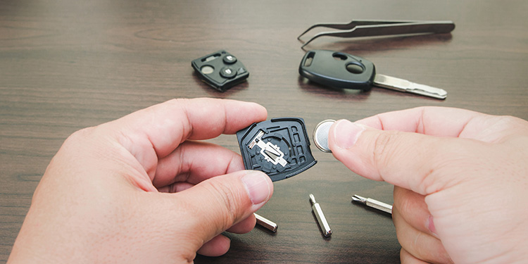 key fob battery being installed