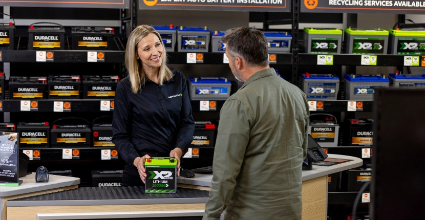 Employee helping a customer