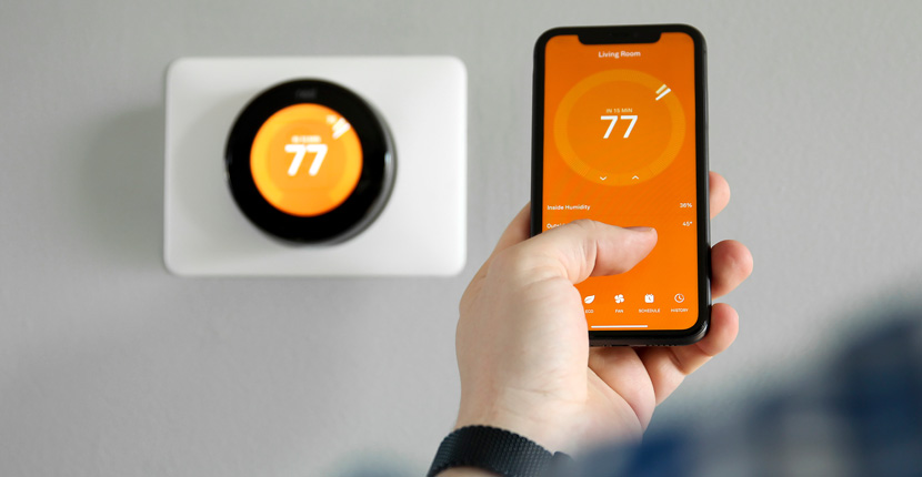 controlling a thermostat with a mobile phone