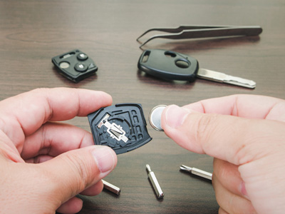 Replacing a battery in a key fob