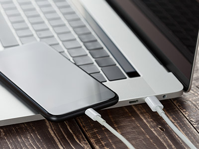 Phone on laptop keyboard