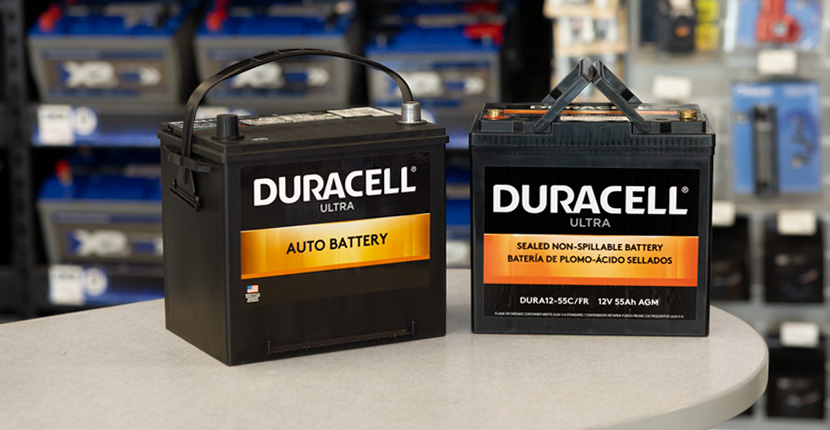 SLI and deep cycle Duracell Ultra batteries sitting on a counter