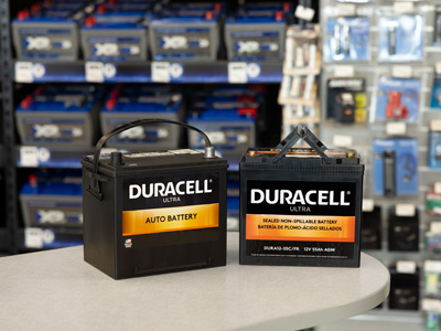 SLI and deep cycle Duracell Ultra batteries sitting on a counter