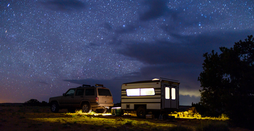 Camping at night with a starry sky