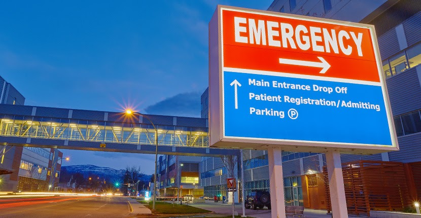 Emergency building with sign lit up