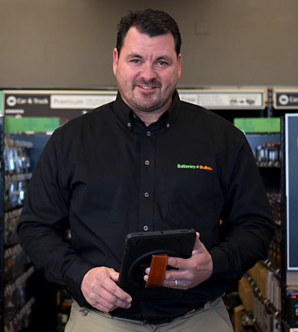 Store employee holding a tablet