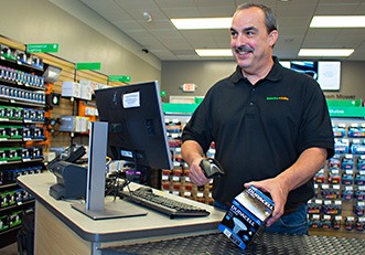 Store employee scanning an item