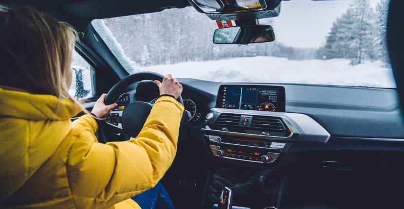 Driving a car while it is snowing
