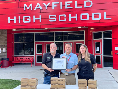 Giving Procell Batteries to Mayfield High School