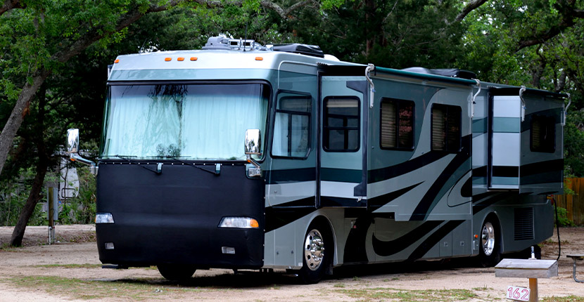 Large RV parked in a camp ground