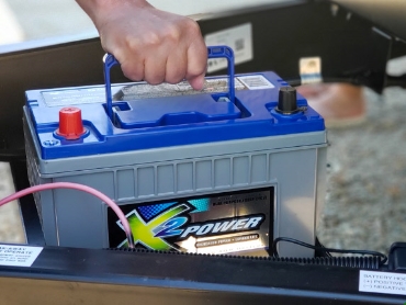 Installing a battery into the tongue of a trailer