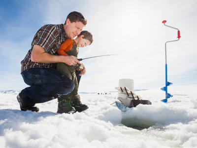 Father and son ice fishing